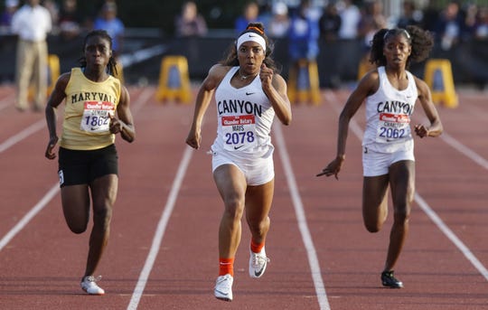 North Canyon's Jadyn Mays lead the 100 meters against Maryvale's  Lucky Matawa Demaih and teammate Jayde Charlton during the 79th Annual Nike Chandler Rotary Invitational  March 23, 2019.