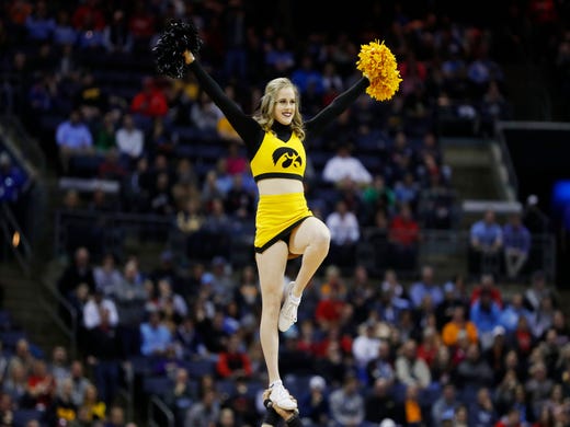 Round of 32: Hawkeyes cheerleader in the first half.