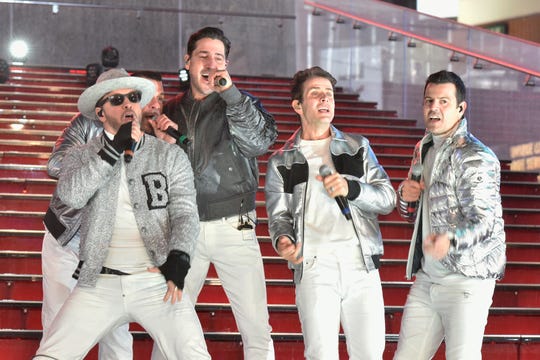 Donnie Wahlberg, Danny Wood, Jonathan Knight, Joey McIntyre and Jordan Knight of New Kids on the Block perform at Dick Clark's New Year's Rockin' Eve With Ryan Seacrest 2019 in New York City.