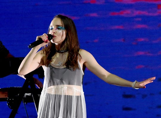 Lauren Mayberry of CHVRCHES performs during KROQ Absolut Almost Acoustic Christmas at The Forum on December 9, 2018 in Inglewood, California.