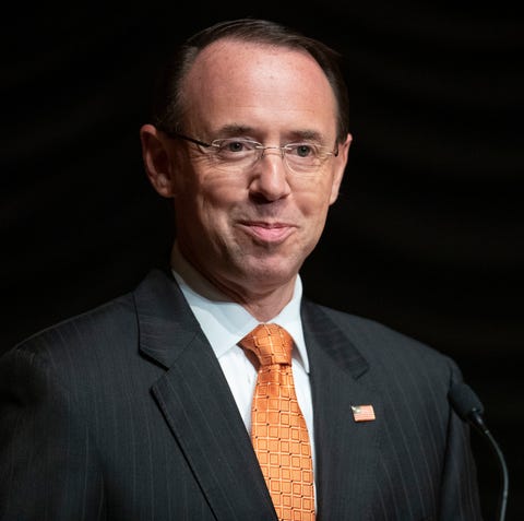 Deputy Attorney General Rod Rosenstein pauses...