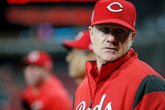 Cincinnati Reds manager David Bell (25) looks down the dugout in the fifth inning of the MLB National League game between the Cincinnati Reds and the Milwaukee Brewers at Great American Ball Park in downtown Cincinnati on Monday, April 1, 2019. The Reds fell 4-3 in the series opener.