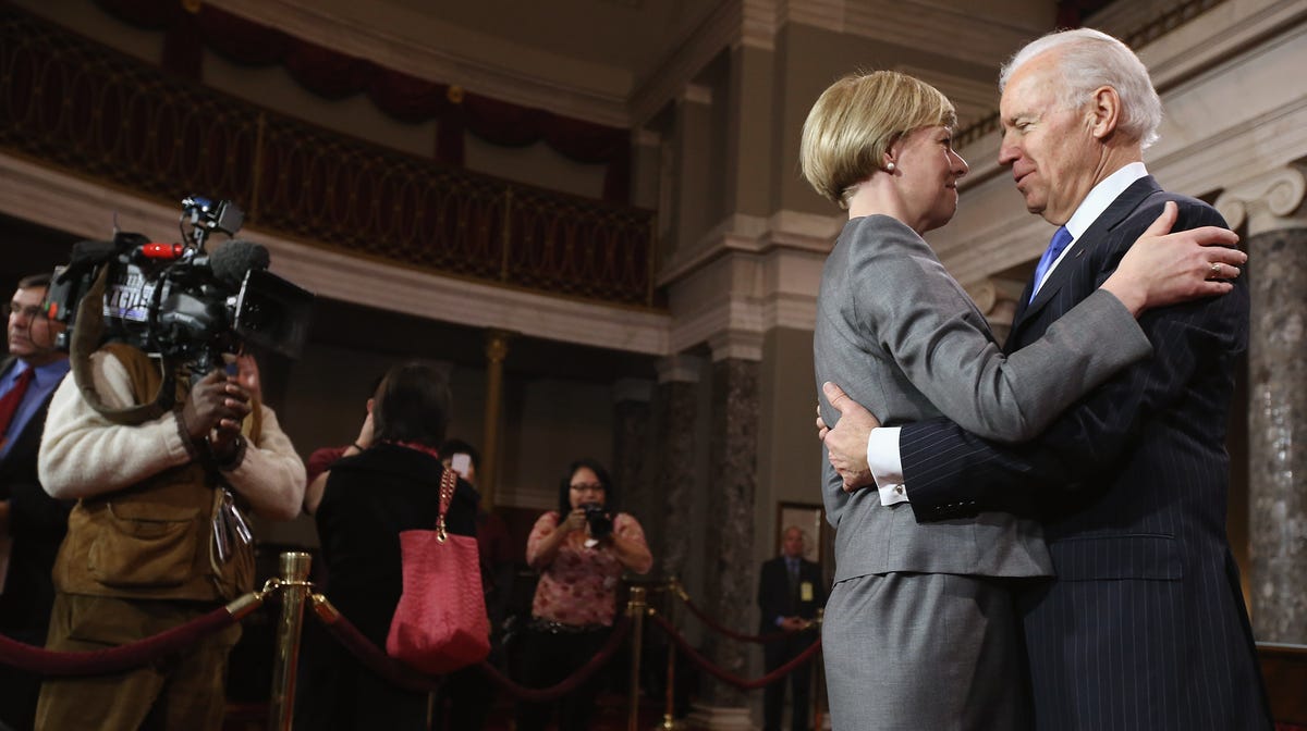 Sen. Tammy Baldwin (D-WI) (L) and then Vice President Joe Biden (R), on Jan. 3, 2013.