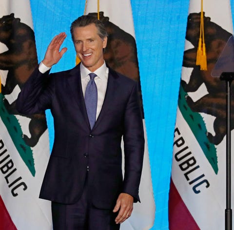 California Governor Gavin Newsom gestures after...