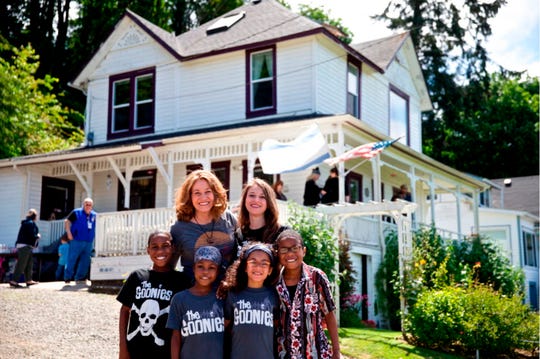 In June 2014, the archival photo shows members of the Hart family at the annual celebration of the 