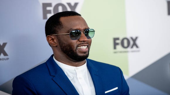 Sean Combs danced with his daughter to the tune of Herb Alpert's "Rise."