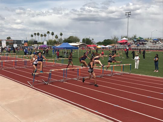 April 12, 2019; girls compete in the 100-meter hurdle event at Hohokam Invitational at Mesa Westwood.