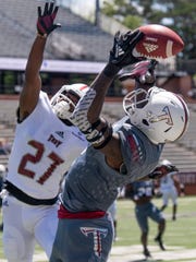 Troy corner back Jawon McDowell (27) breaks up a pass intended for wide receiver Reggie Todd (2) during the Troy University T-Day spring scrimmage game in Troy, Ala., on Saturday April 20, 2019. 