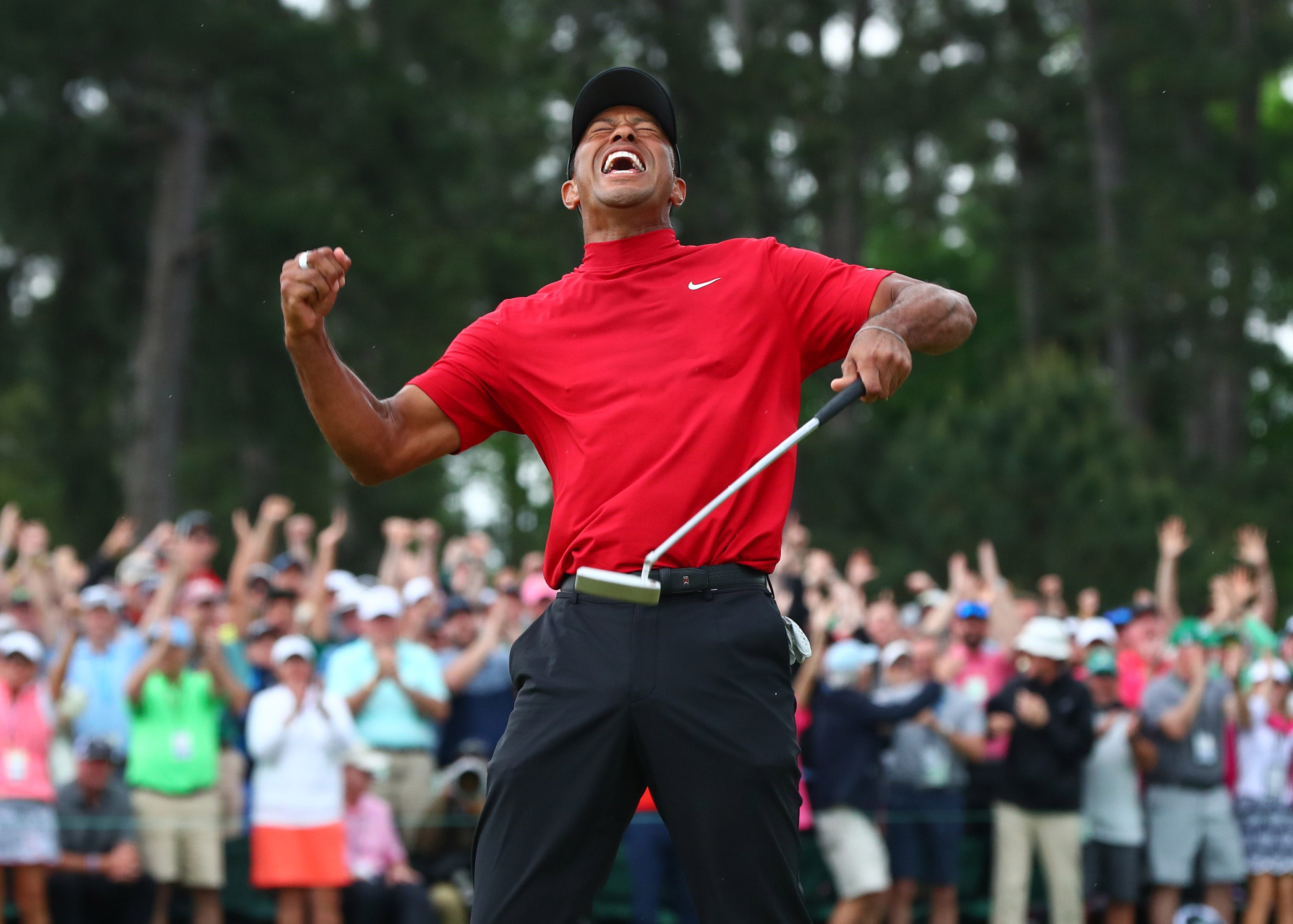 Tiger Woods' Masters victory: Story behind iconic photos at Augusta