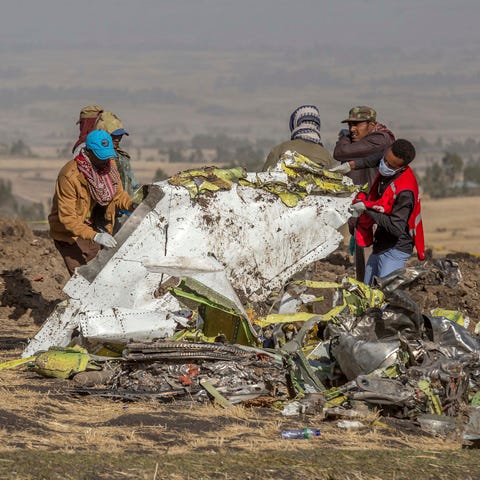 Rescuers work at the scene of an Ethiopian...