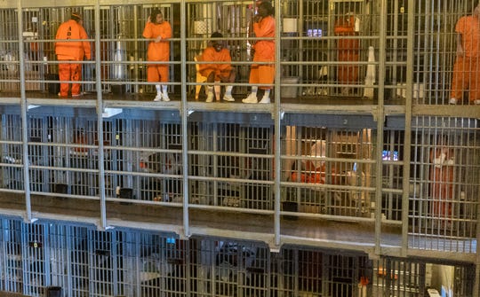 Inmates in their cells at Arizona State Prison Complex in Florence.