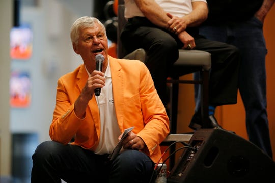 Former Bengals quarterback Ken Anderson tells a story from his playing days during the Legends Past and Present event benefitting the Andy and JJ Dalton Foundation and Ken Anderson Alliance at Paul Brown Stadium in downtown Cincinnati on Tuesday, April 30, 2019. 