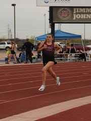 Niki Hemmerlin runs an 800 meter race for Red Mountain