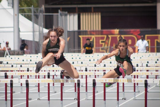 Campo Verde's Lia Kendricks and Kiana Kai run the 300 meter hurdles at the 40th ASU Sun Angel Classic on April 6, 2019.