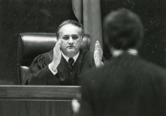 Judge James B. "Buddy" Scott talks in court in March 1984.