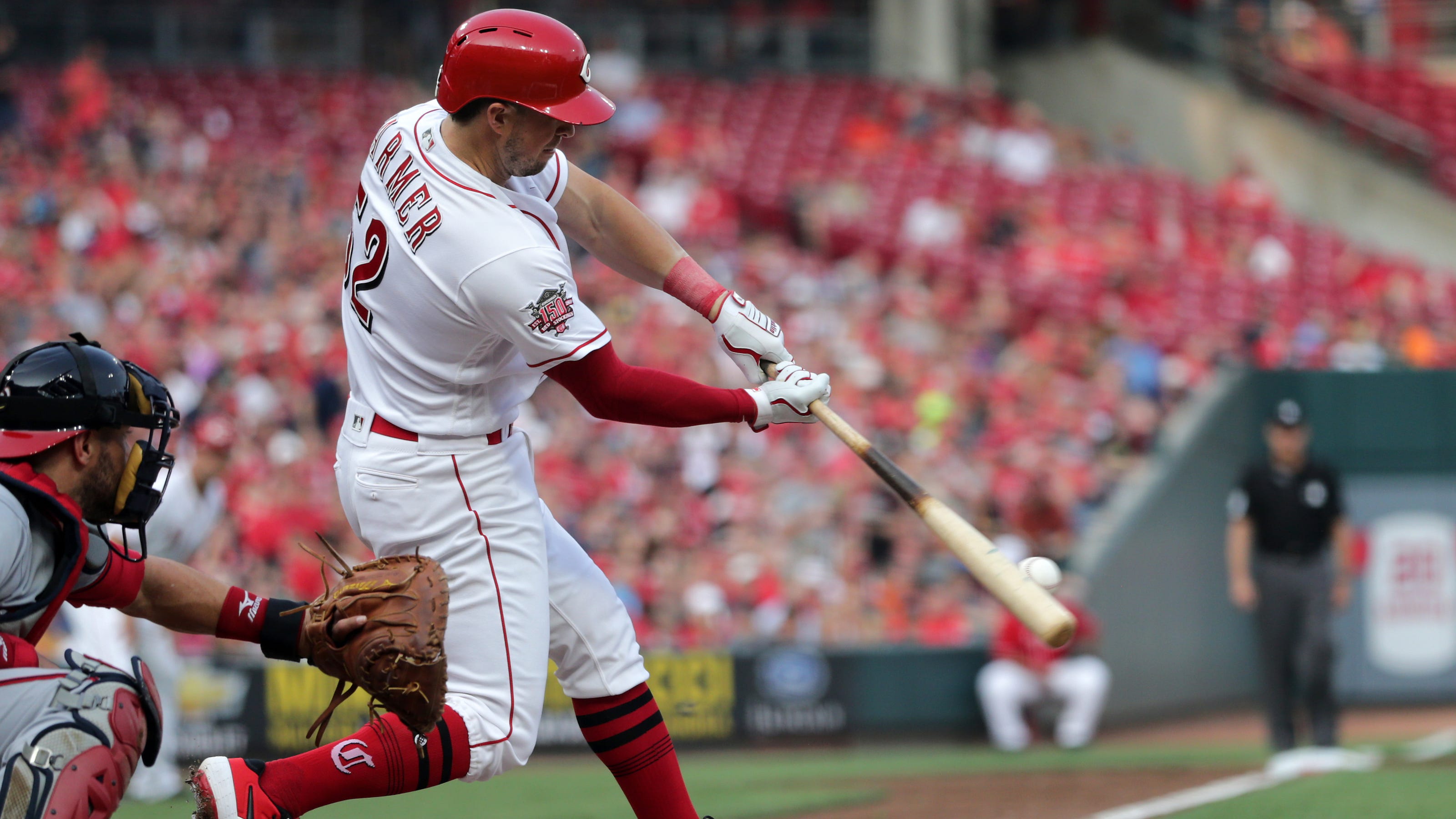 Kyle Farmer just fine behind the plate for the Cincinnati Reds