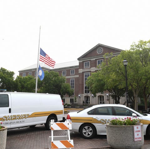 Virginia Beach Sheriff vehicles sit outside of...