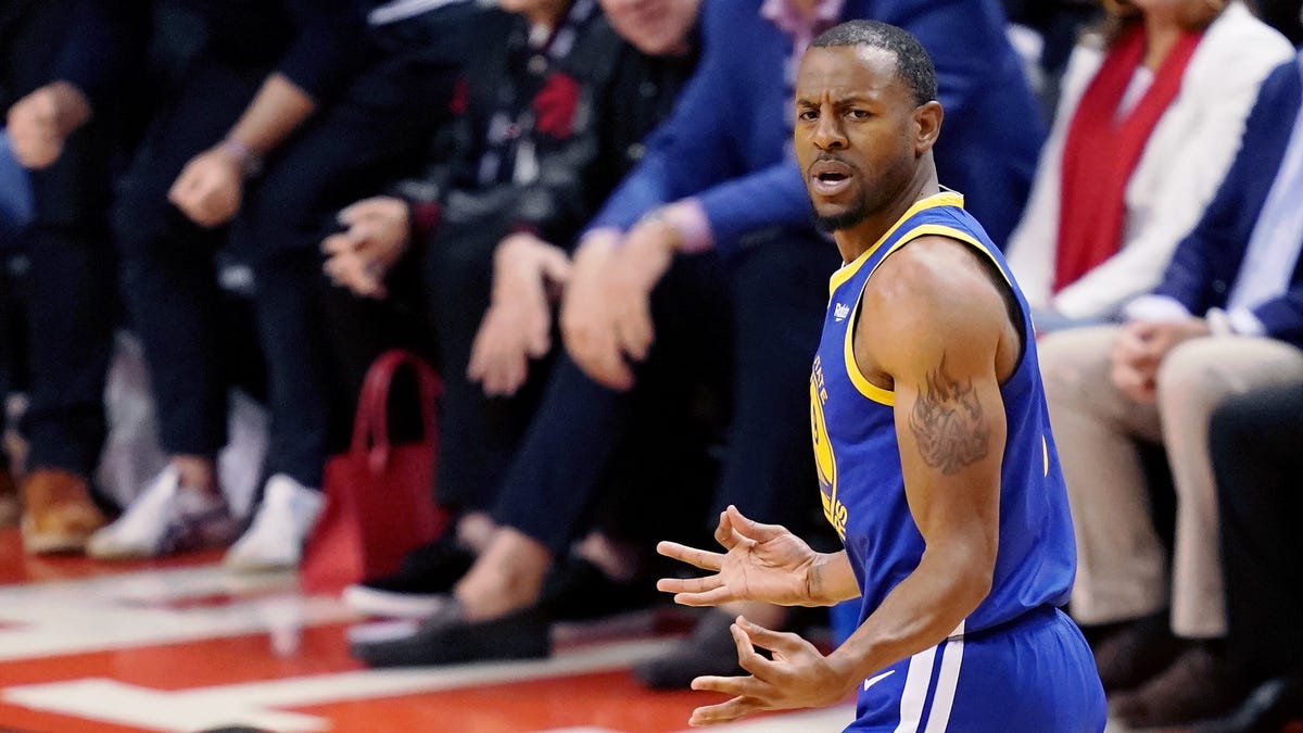 Andre Iguodala gestures after making a 3-pointer against the Raptors.