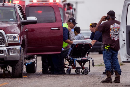 A police chase from Robstown of about 14 people in a suburb Tuesday night ended with the discovery of a wreck on Wednesday morning, killing six, injuring five, and two in custody. Border Patrol located just outside Robstown, Texas. Several agencies responded to the scene Wednesday, June 5, 2019 to help transport the wounded, including this man, and travel the area to make sure everyone was taken into account.