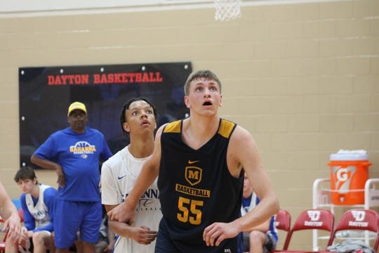 Moeller junior Logan Duncomb gets position for a rebound at Dayton Flyers team in June