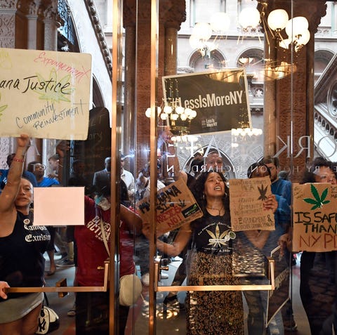 Protesters urging legislators to pass Marijuana le