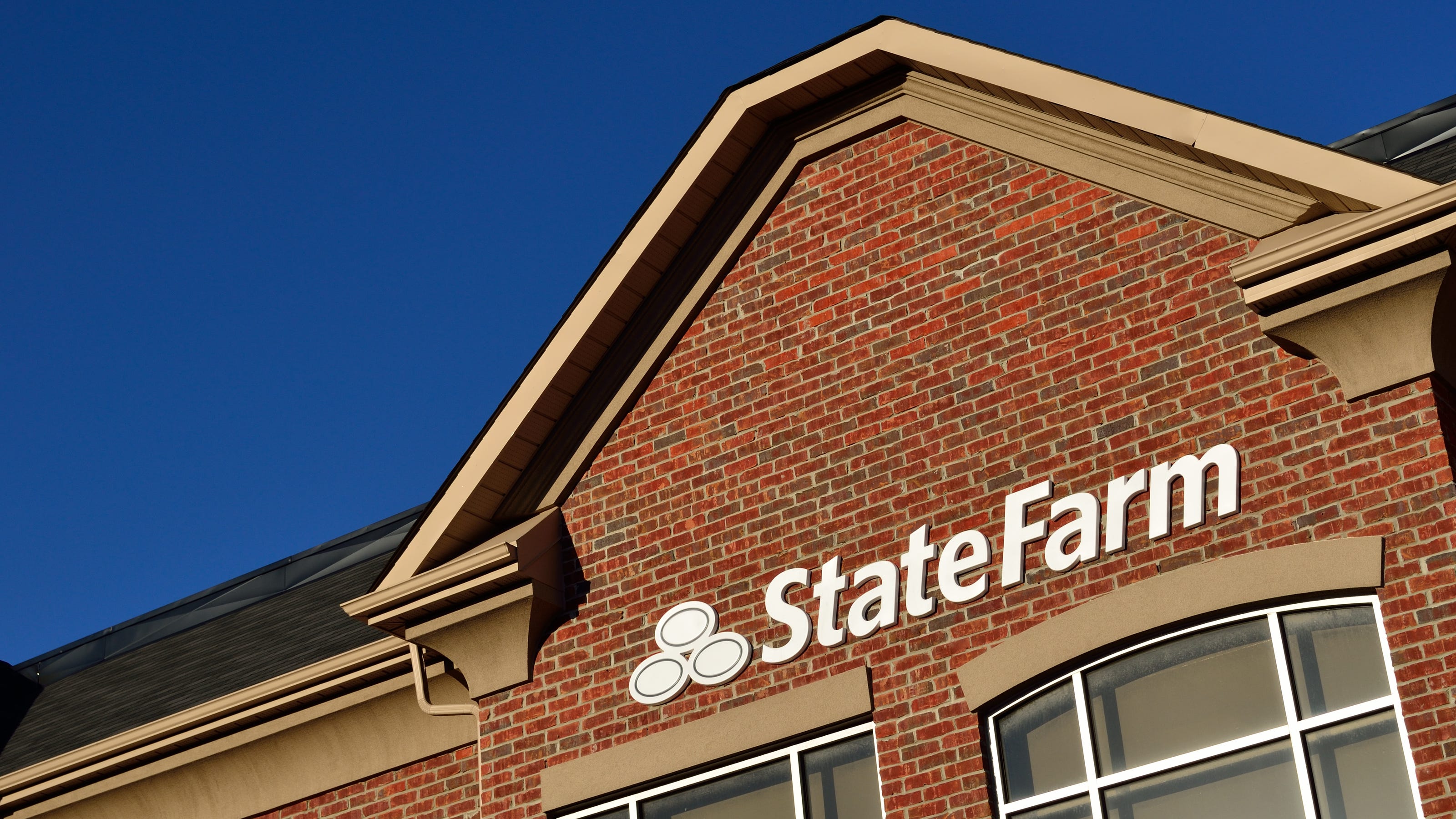 State Farm to close Indianapolis facility, lay off 100 workers