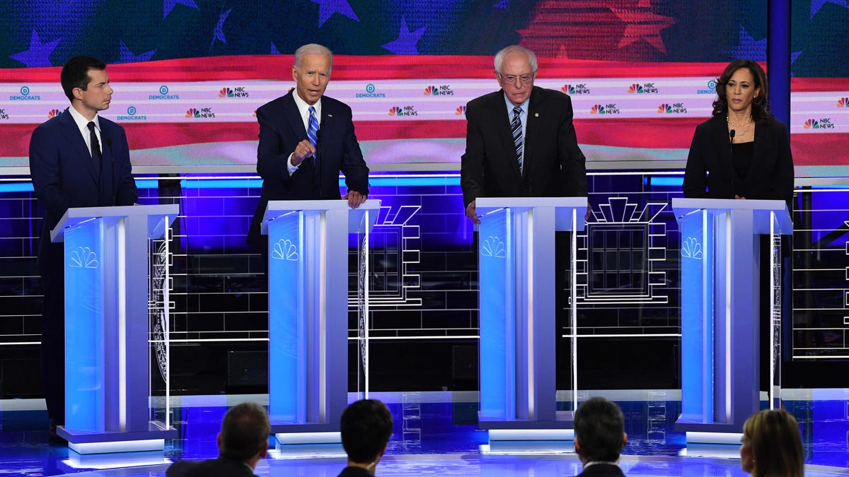 Democratic presidential hopefuls (from left) South Bend, Indiana, Mayor Pete Buttigieg, Former Vice President Joe Biden, Vermont Sen. Bernie Sanders and California  Sen. Kamala Harris speak during the second Democratic primary debate of the 2020 presidential campaign season hosted by NBC News at the Adrienne Arsht Center for the Performing Arts in Miami, Florida.