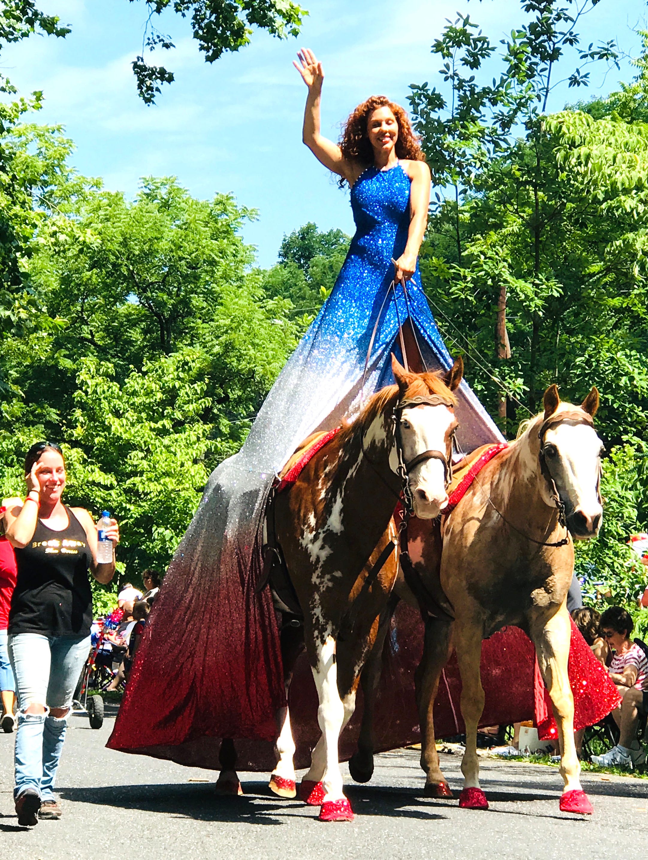 Fairland Ferguson rides her horses in the Happy Birthday America parade