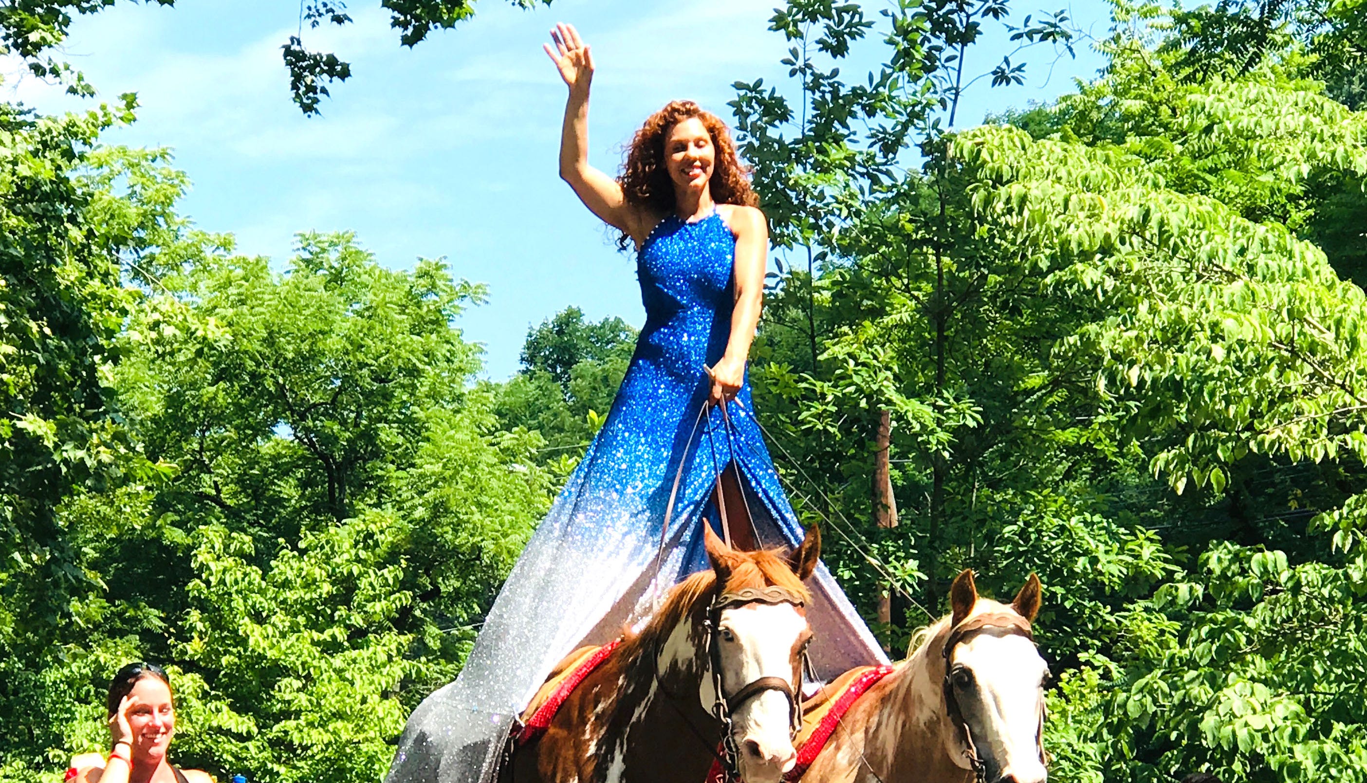 Fairland Ferguson rides her horses in the Happy Birthday America parade