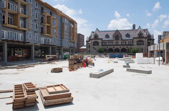 Construction of Post House continues in front of the Old Post Office off Second Street in Downtown Evansville Wednesday, July 5, 2019. 