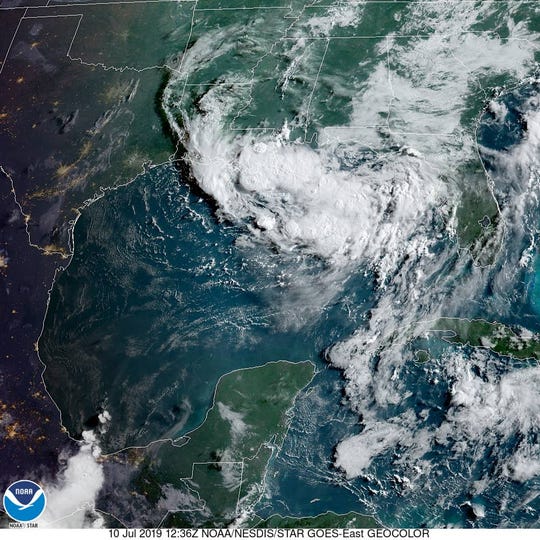 A tropical depression was slowly organizing over the northern Gulf of Mexico, as shown by this satellite image of July 10, 2019.