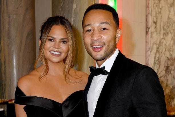 Chrissy Teigen and John Legend in June in Paris.