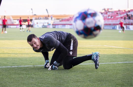 Phoenix Rising FC goalkeeper Zac Lubin  warms before a game against Las Vegas Lights FC on June 13, 2018.