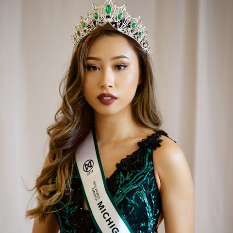 Kathy Zhu, 20, accepting her Miss Michigan Crown...