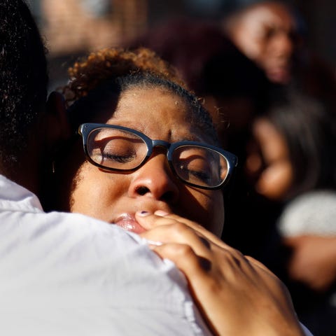 Two students hugging in Columbia, Missouri.