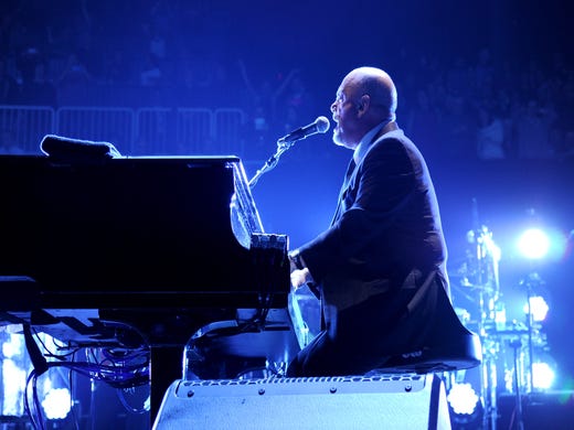 NEW YORK, NY - DECEMBER 31: Billy Joel performs onstage during his New Year's Eve Concert at the Barclays Center of Brooklyn on December 31, 2013 in New York City. (Photo by Kevin Mazur/WireImage) ORG XMIT: 460796887 ORIG FILE ID: 459842545