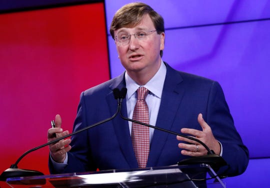 Lt. Gov. Tate Reeves responds to a question during a televised GOP gubernatorial primary debate in Jackson, Miss., Tuesday, July 23, 2019. (AP Photo/Rogelio V. Solis)