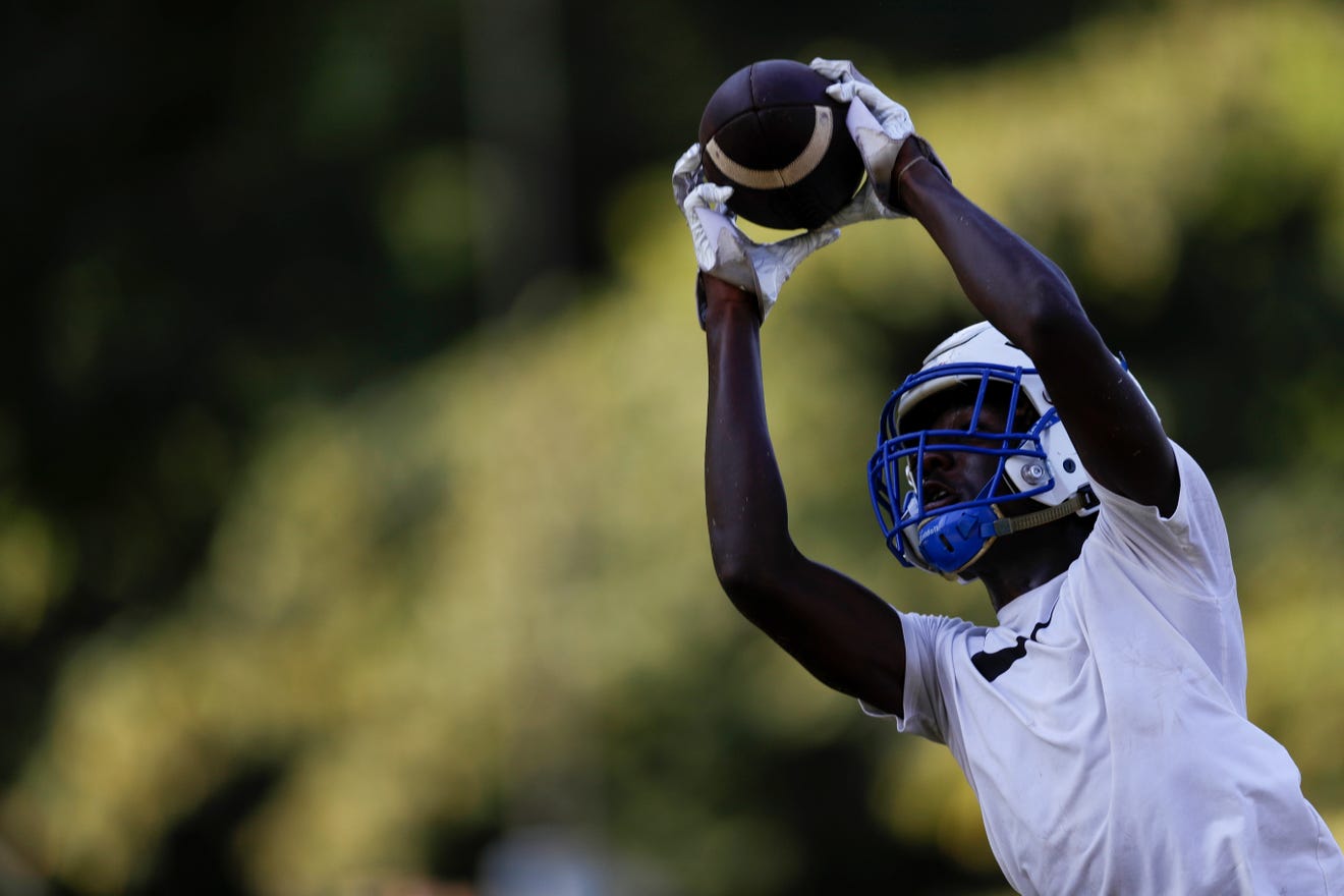 Godby, Rickards embrace new aspects on first day of football practice