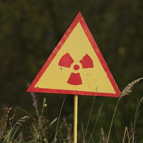 A sign warns of radiation at the site of Kopachi...