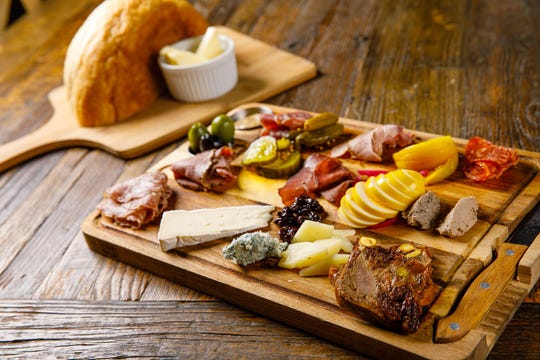 The charcuterie board, made from house-cured meats and pates, from Rosy Tomorrows Heritage Farm in North Fort Myers.