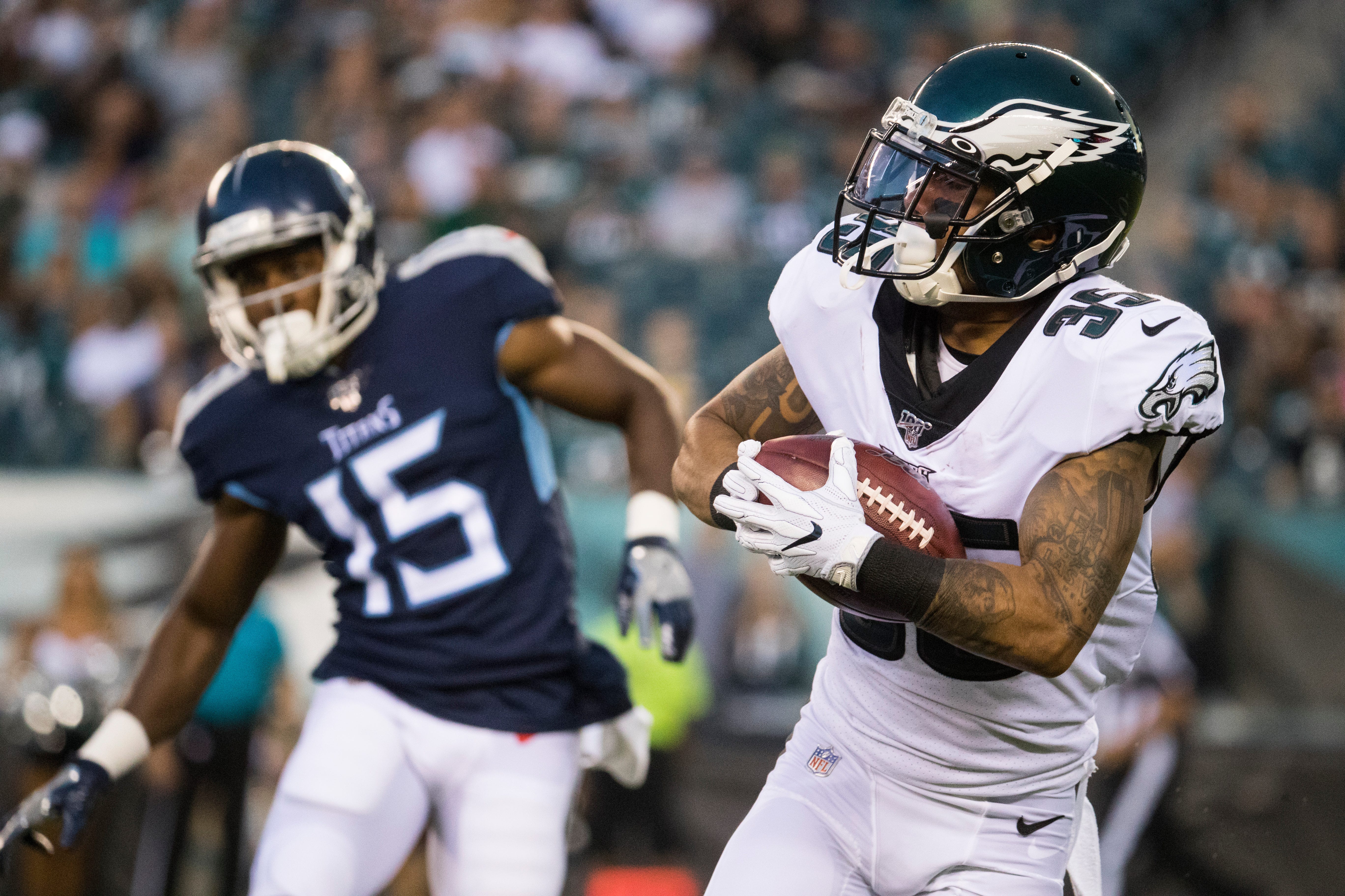 Philadelphia Eagles running back Wendell Smallwood (28) hurdles over  teammate Jason Kelce (62) during second quarter action against the Los  Angeles Chargers at StubHub Center in Carson, California on October 1, 2017.