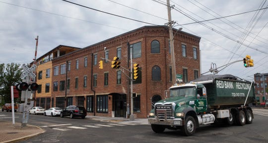 Metrovation is redeveloping the former Anderson Moving & Storage building on Monmouth Street in Red Bank into a 49,000-square-foot mixed use building. A Sickles wine shop and market will occupy the ground floor.