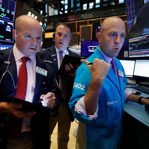 Traders Patrick Casey, left, and Jonathan Corpina,