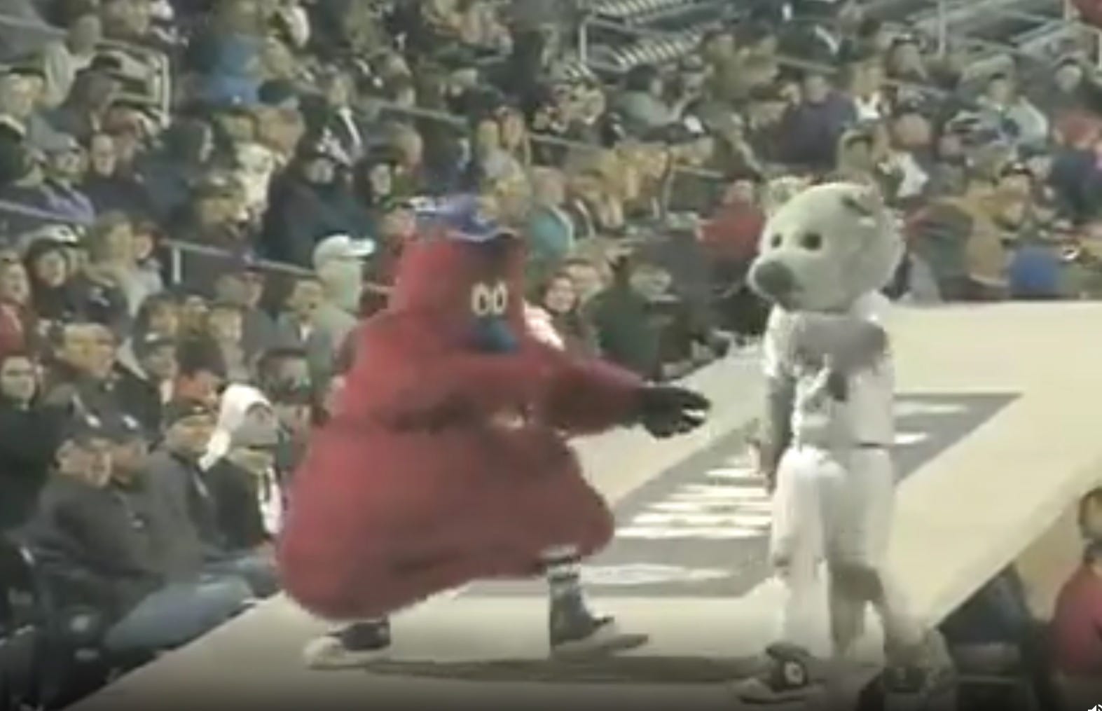 From 2010: Nevada Wolf Pack mascot falls off Reno Aces dugout