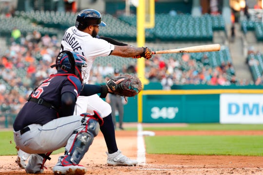 Detroit Tigers third baseman Ronny Rodriguez (60) hits an RBI single in the second inning against the Cleveland Indians at Comerica Park in Detroit, Tuesday, Aug. 27, 2019.