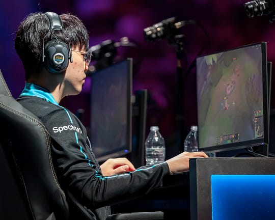 Vincent "Biofrost" Wang of Team Counter Logic Gaming works his controls as he watches his screen during Day 1 of the 2019 LCS Summer Finals at Little Caesars Arena on Aug. 24.