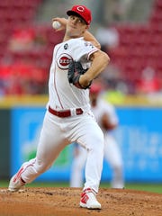 Cincinnati Reds starting pitcher Sonny Gray (54) delivers in the first inning of an MLB baseball game against the Milwaukee Brewers, Tuesday, Sept. 24, 2019, at Great American Ball Park in Cincinnati. 