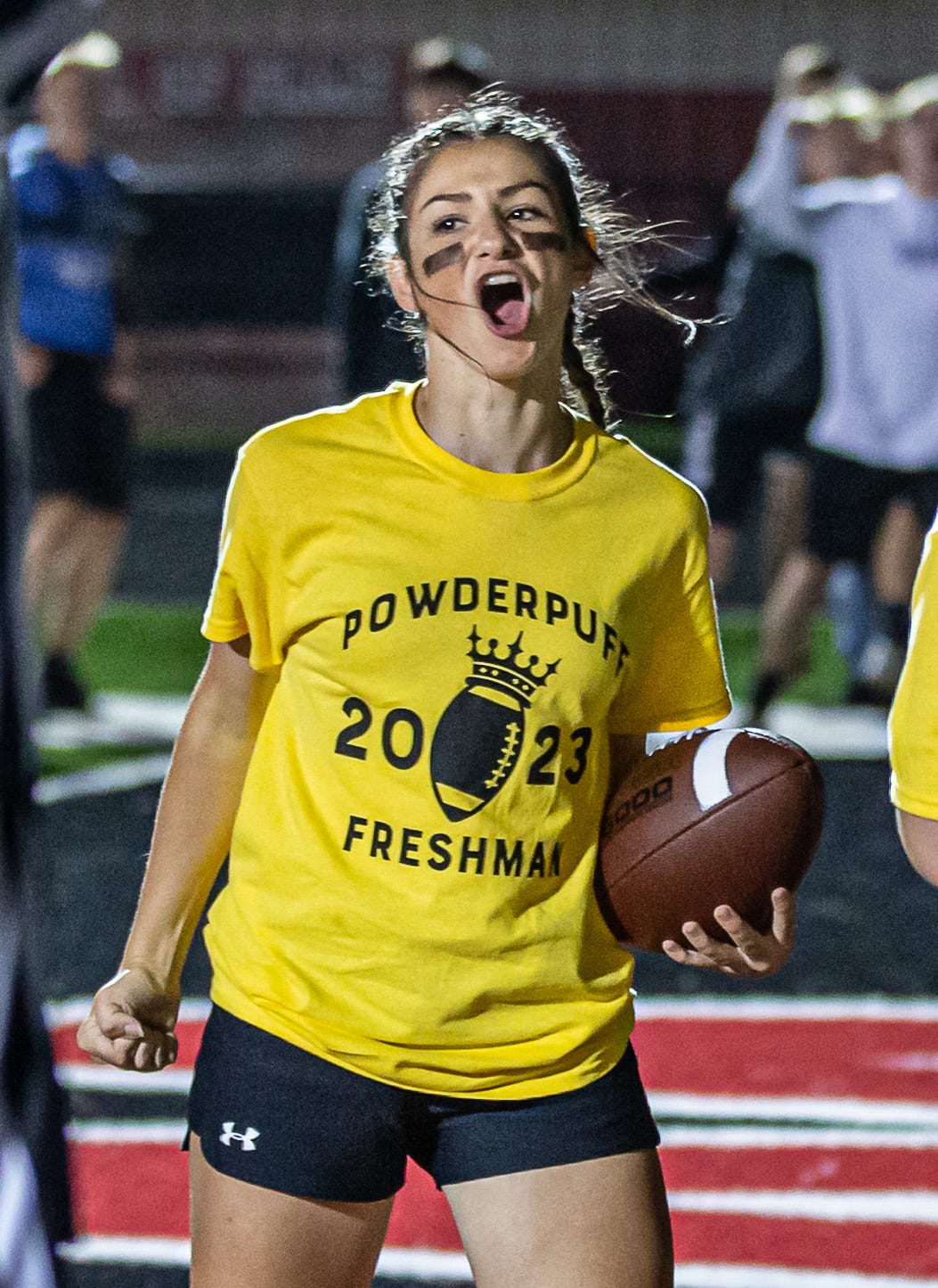 girl at football game