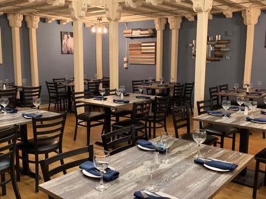 The first-floor dining room of Denim BYOB in Haddonfield.