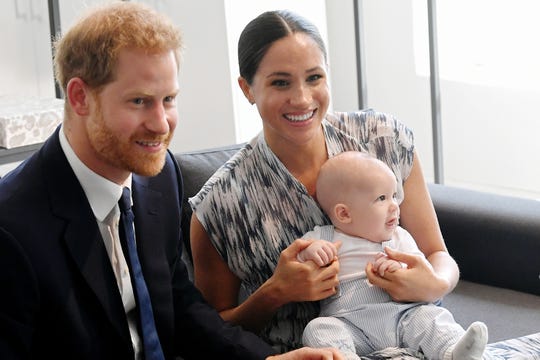 Prince Harry, Duchess Meghan and their baby son, Archie Mountbatten-Windsor, during their royal tour of South Africa on Sept. 25.